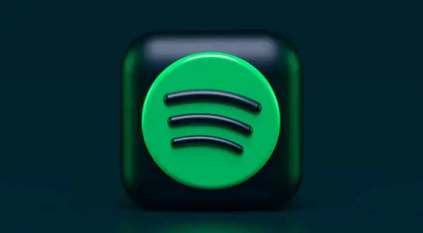 Ikona Spotify na ciemnym tle.
